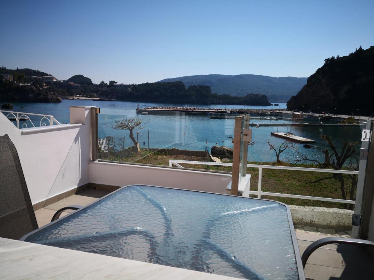 Molos Beach Apartments Палеокастрица Экстерьер фото